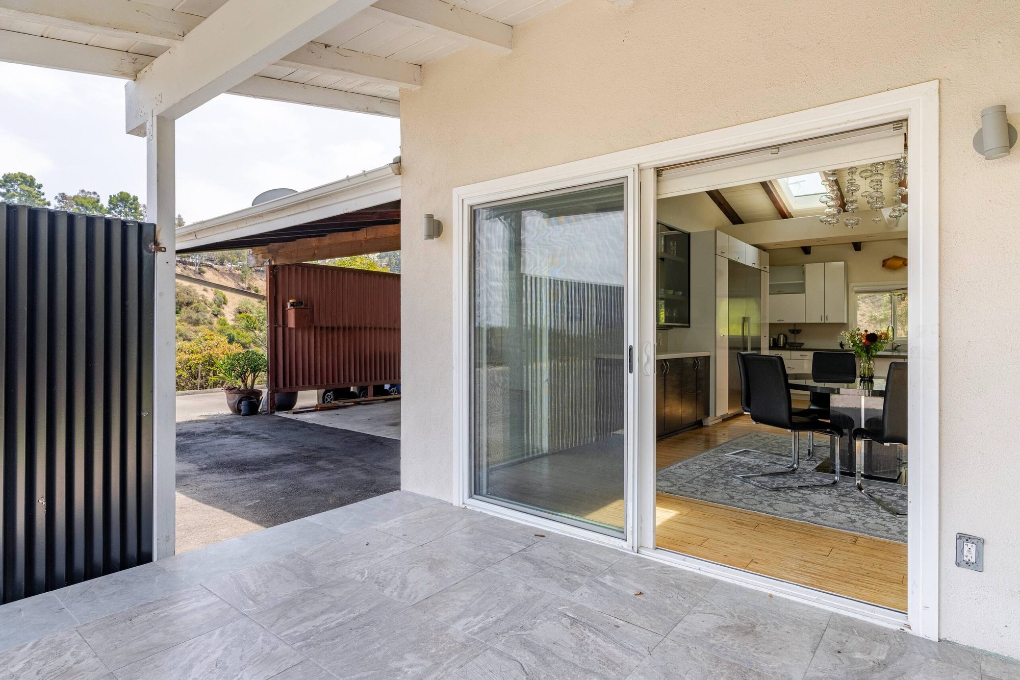Covered carport with wood beams